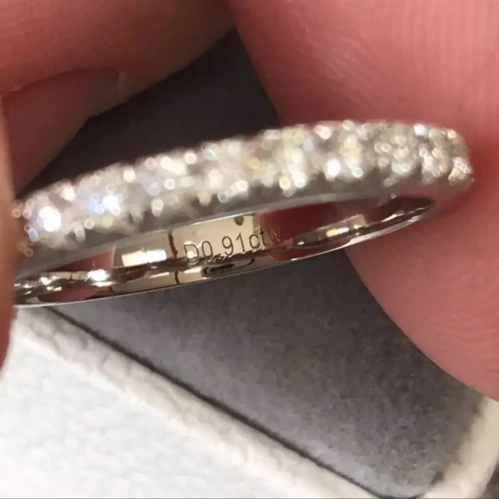 Round brilliant eternity wedding band